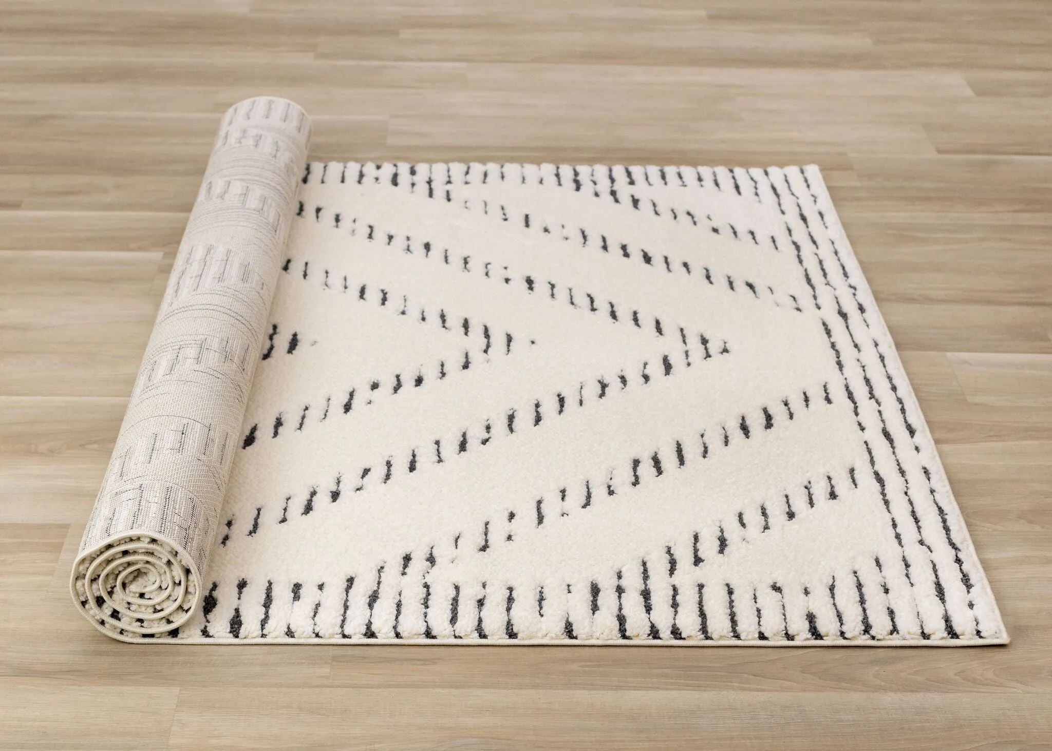 Talia 5'3" x 7'7" Striped Diamond Design Area Rug - Cream, Black
