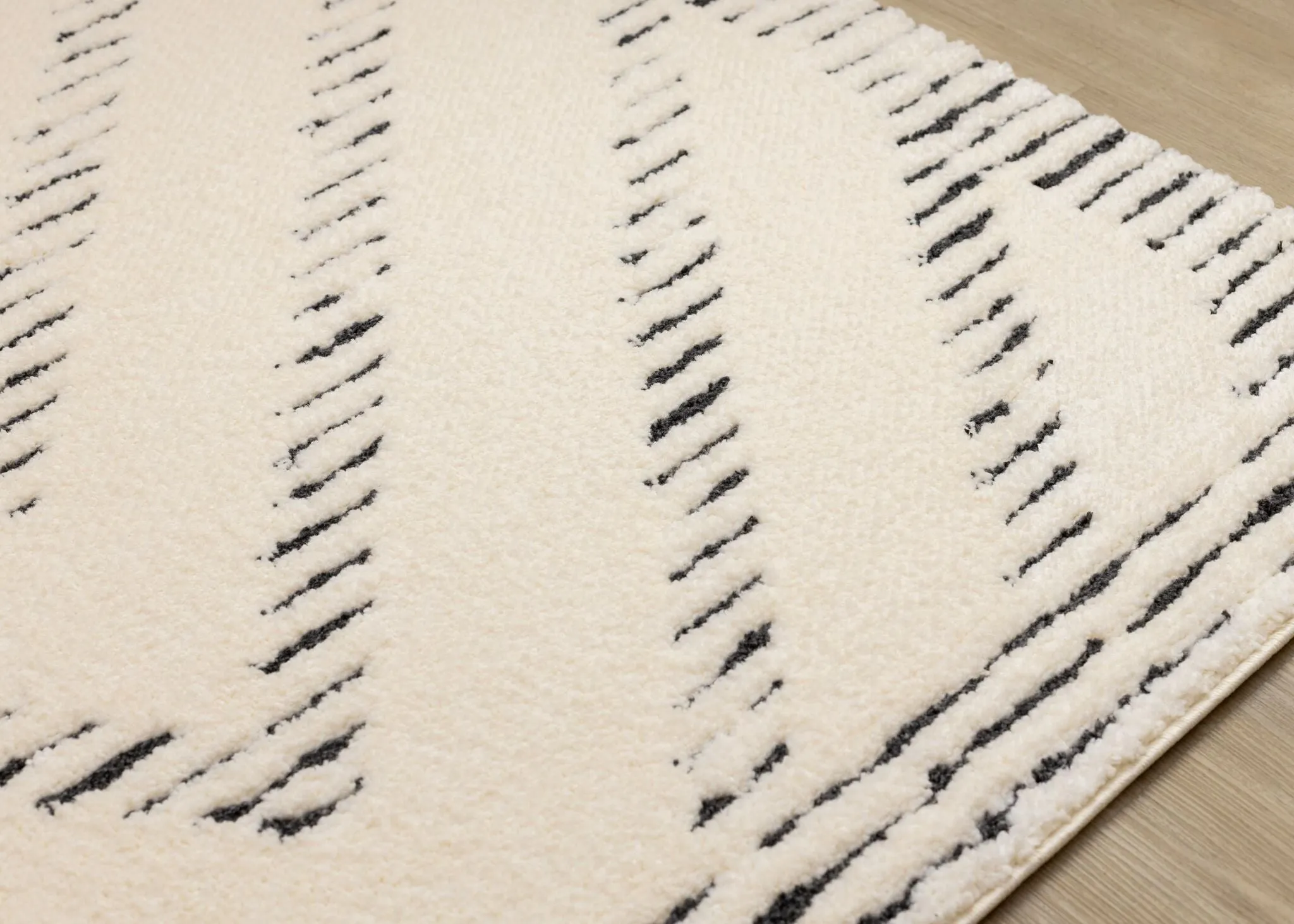 Talia 5'3" x 7'7" Striped Diamond Design Area Rug - Cream, Black
